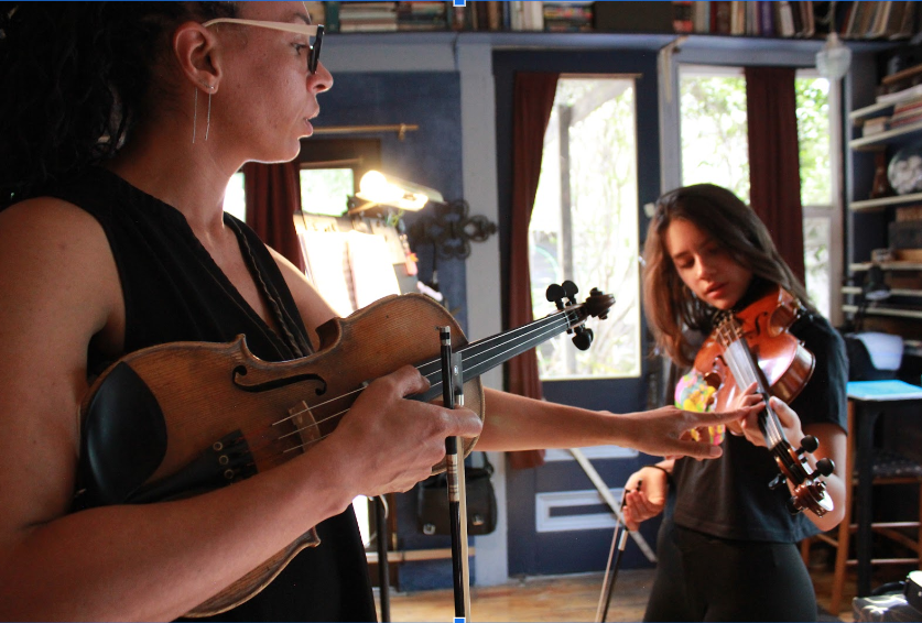 Harriett Landrum giving a music lesson in Colorado Springs