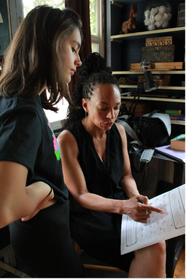 Harriett teaching music theory to student during music lessons in Colorado Springs